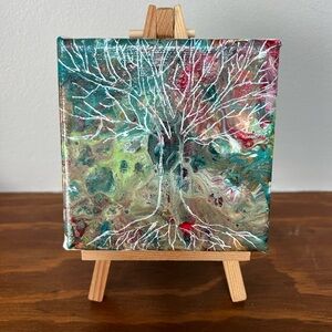 canvas painting with easel shown